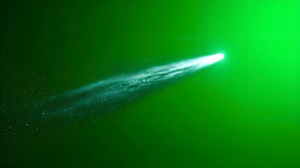 Fototapeta premium A teal comet streaks across a green background.