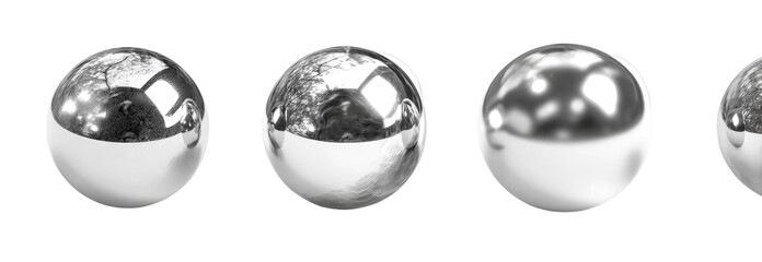 Four polished metallic spheres in grayscale