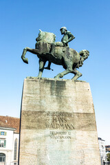 Bronze equestrian statue of Hans Waldmann by Hermann Haller (1937) on the Munsterbrucke bridge,...