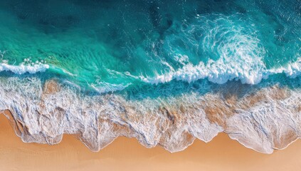 Fototapeta premium Aerial view of a beach with waves. Ocean waves crashing on a sandy shore, vibrant colors