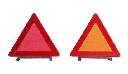 Two red and orange warning triangles, isolated on black