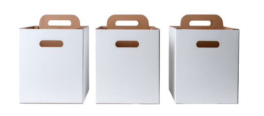 Three white cardboard boxes with brown handles