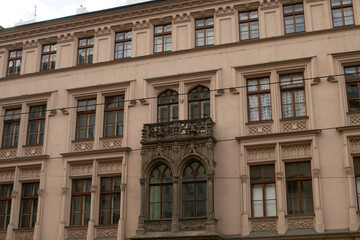 Facade of a historic building. Cultural heritage and architectural detail in an urban environment. 