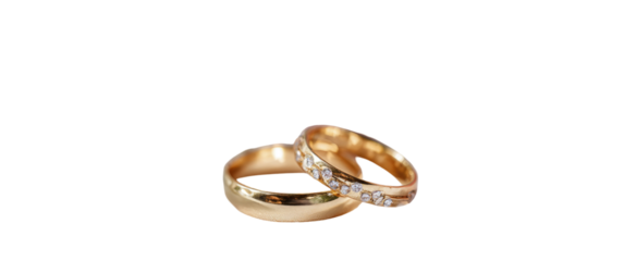 Two gold wedding rings, stacked, with small diamonds