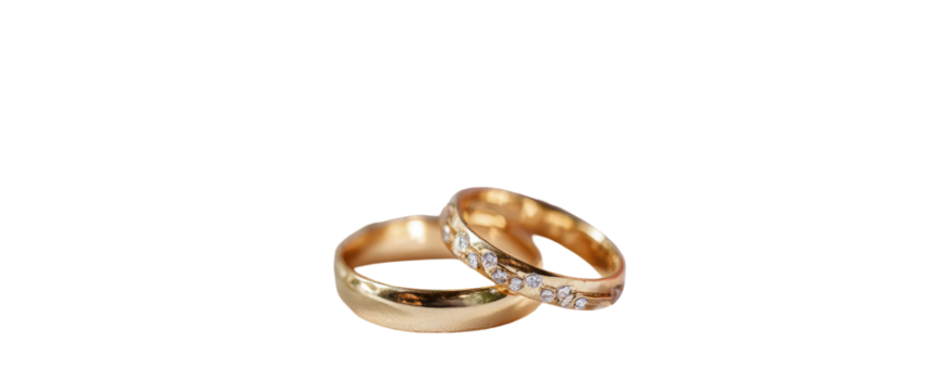 Two gold wedding rings, stacked, with small diamonds
