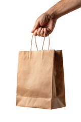 A hand holds a brown paper bag