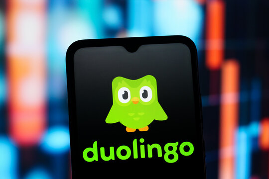 In this photo illustration, the Duolingo logo is seen displayed on a smartphone screen.