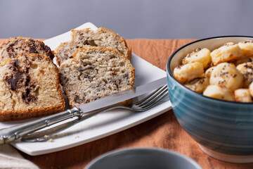 Slices of homemade banana bread and chocolate bread for breakfast or a snack.