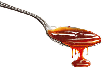 Spoonful of dark reddish-brown sauce dripping
