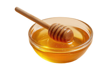 Honey in a glass bowl with wooden dipper.  Golden liquid honey fills a clear glass bowl.  A light-colored wooden dipper is partially submerged, stirring the honey