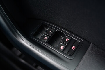 Electric Window Control Switches in Modern Car Interior