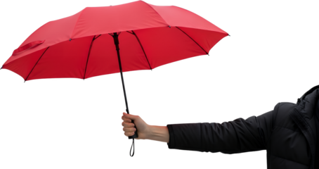 Person's hand holding open red umbrella black jacket sleeve isolate weather protection rain accessory