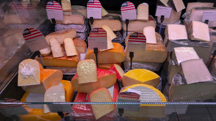 Assortment of artisan cheeses from Mallorca and Menorca in supermarket. Balearic Islands products,...