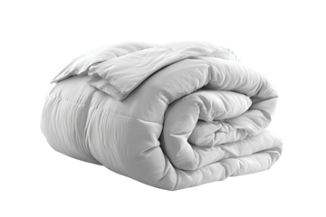 Rolled white comforter on a black background