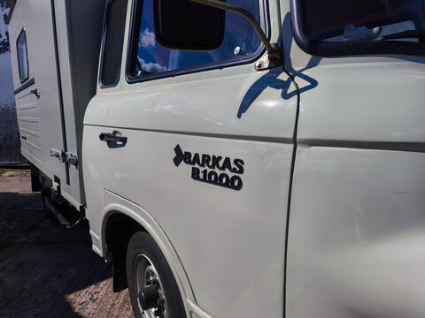 Havel, Germany - September 07, 2025: Barkas B1000 vintage van parked under a clear blue sky, showcasing its classic design and unique branding for automotive enthusiasts and collectors