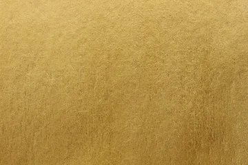 Gold paper texture background. gold wall background © peekeedee