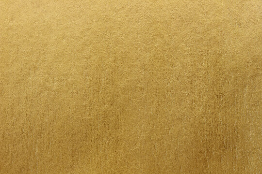 Gold paper texture background. gold wall background