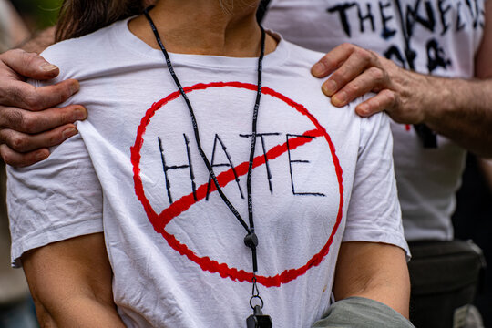 Close up of no hate symbol on t-shirt at rally.
