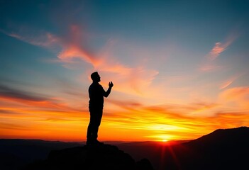Silhouette of a figure preaching from a mountaintop at sunset, spiritual message,  faith,  inspirational