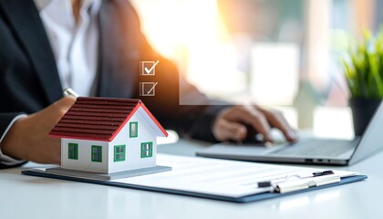 Businessperson reviewing house documents