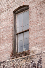 old window in brick wall
