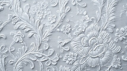 Light gray background with a detailed, embossed floral pattern