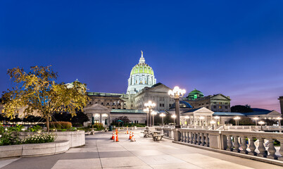 The Pennsylvania State Capitol in Harrisburg, Pennsylvania, USA. This historic Beaux-Arts landmark is illuminated against the sky during the blue hour
