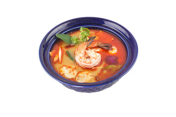 Tom Yam soup with shrimps, Thailand sour and spicy shrimp soup in blue plate on white background