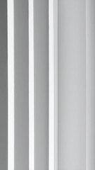 Obraz premium Abstract White Wall Design with Vertical Lines and Shadows for Modern Architecture Style