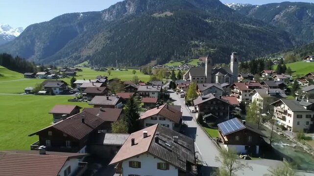 Idyllic mountain village scenery, a European alpine settlement view