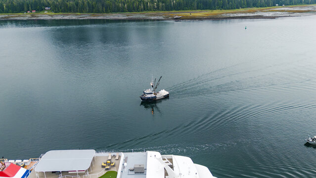 Aerial view of fishing boat in Alaskan waterway