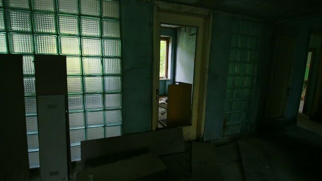 Interior view of the desolate and decaying Sanitary and Epidemiological Station in the ghost city of Pripyat, Ukraine, located within the Chernobyl Exclusion Zone. This haunting image captures the eer