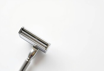 Naklejka premium Sleek, metallic shaving razor isolated against pure white backdrop, texture, smooth