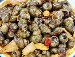 Close-up of stir-fried snails