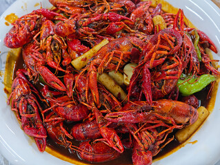 close up of a plate of spicy crayfish