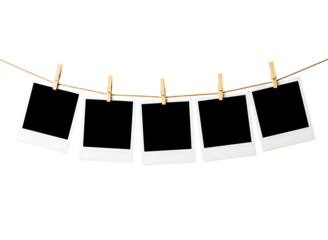 empty instant photo frames hanging on a clothesline with clothespins isolated on transparent background