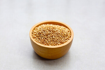 Raw quinoa seeds in a bowl.