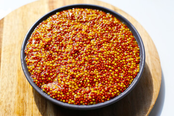 Wholegrain mustard seeds in brine