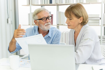 Mature married couple plan money invest for retired