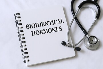 Bioidentical Hormones Information Guide with Medical Stethoscope for Hormone Replacement Therapy Consultation and Treatment