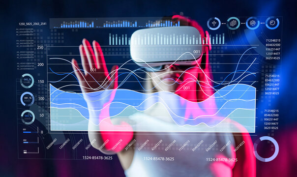 Futuristic woman interacting with virtual reality interface and digital data charts while wearing VR headset in immersive technology environment