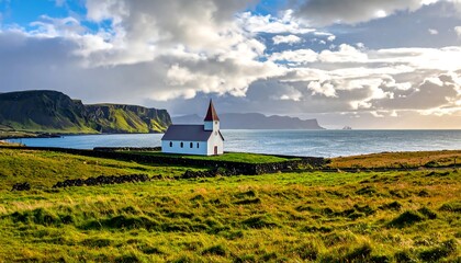 Coastal church on a grassy field under dramatic sky
