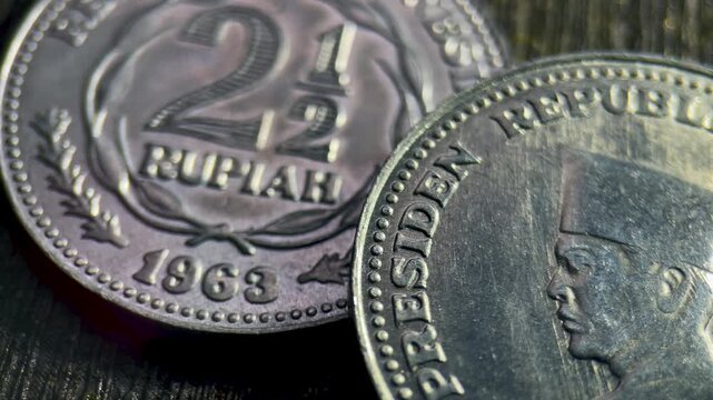 2.5 irian rupiah coin closeup reveals indonesian heritage on this 1963 two and half treasure.