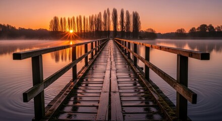 Obraz premium Tranquil lake view with the wooden bridge at dawn for contemplation