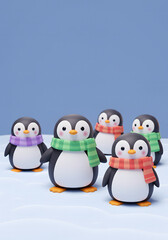 Fototapeta premium Adorable Penguins in Winter Scarves A Cute 3D Render