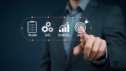 Business professional engaging with PDCA cycle on digital interface