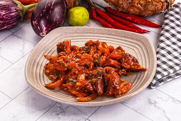 Asian cuisine - pork in chili sauce