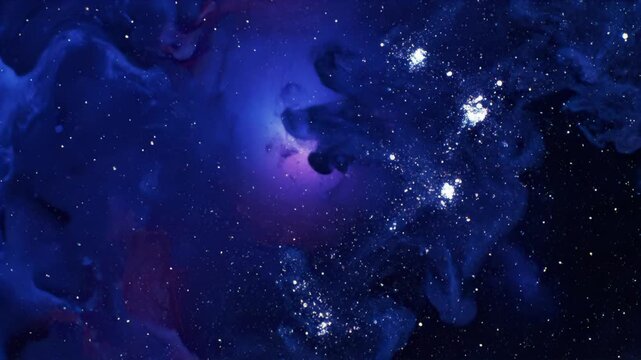 Ink-in-water cosmic swirl with glitter stars in macro slow motion