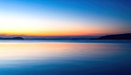 Fototapeta premium Serene Sunset Over Calm Water