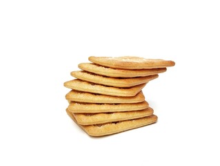 Pile of square sweet cracker biscuits isolated on white background 
